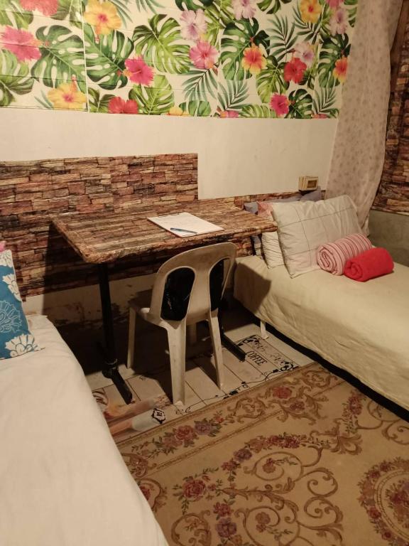 Postel nebo postele na pokoji v ubytování Maraño's Home