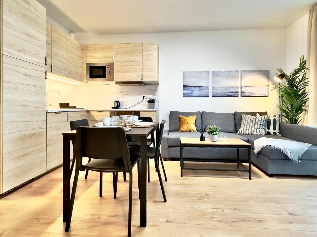 A kitchen or kitchenette at Yarn - brand new - free parking - balcony with city view - Central shopping mall