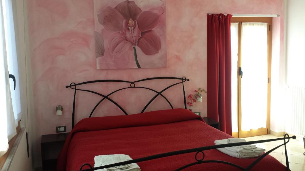 Postel nebo postele na pokoji v ubytování Guest house Il Giardino in Città