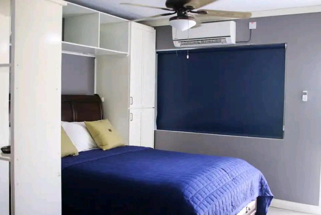 Un pat sau paturi într-o cameră la Carter's Nest