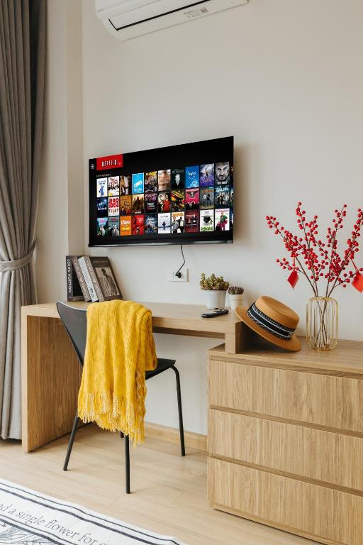 TV a/nebo společenská místnost v ubytování Myrcella Urban Studio