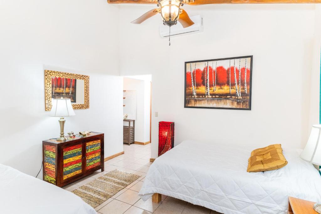 Postel nebo postele na pokoji v ubytování Hacienda La Norma Boho Boutique Hotel