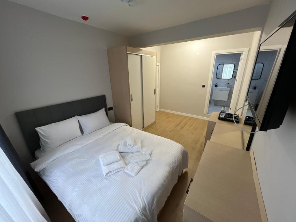 Postel nebo postele na pokoji v ubytování MOF Comfort Edirne