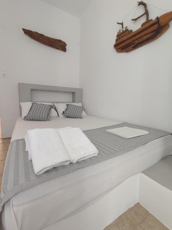 Postel nebo postele na pokoji v ubytování Agnanti Hotel