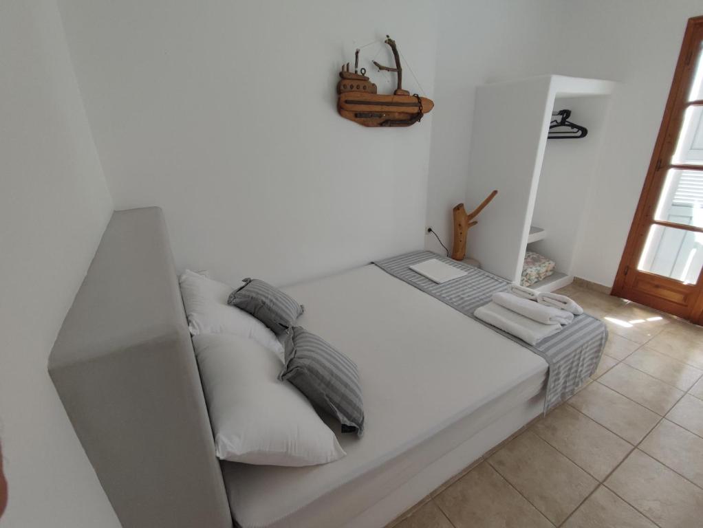 Postel nebo postele na pokoji v ubytování Agnanti Hotel
