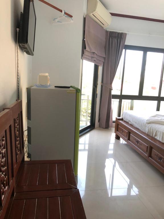 Postel nebo postele na pokoji v ubytování Hotel premier