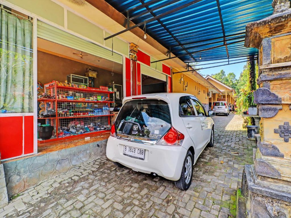 Fotografie z fotogalerie ubytování SPOT ON 92399 Hotel Sekar Jagat Near Pantai Baluk Rening v destinaci Negara