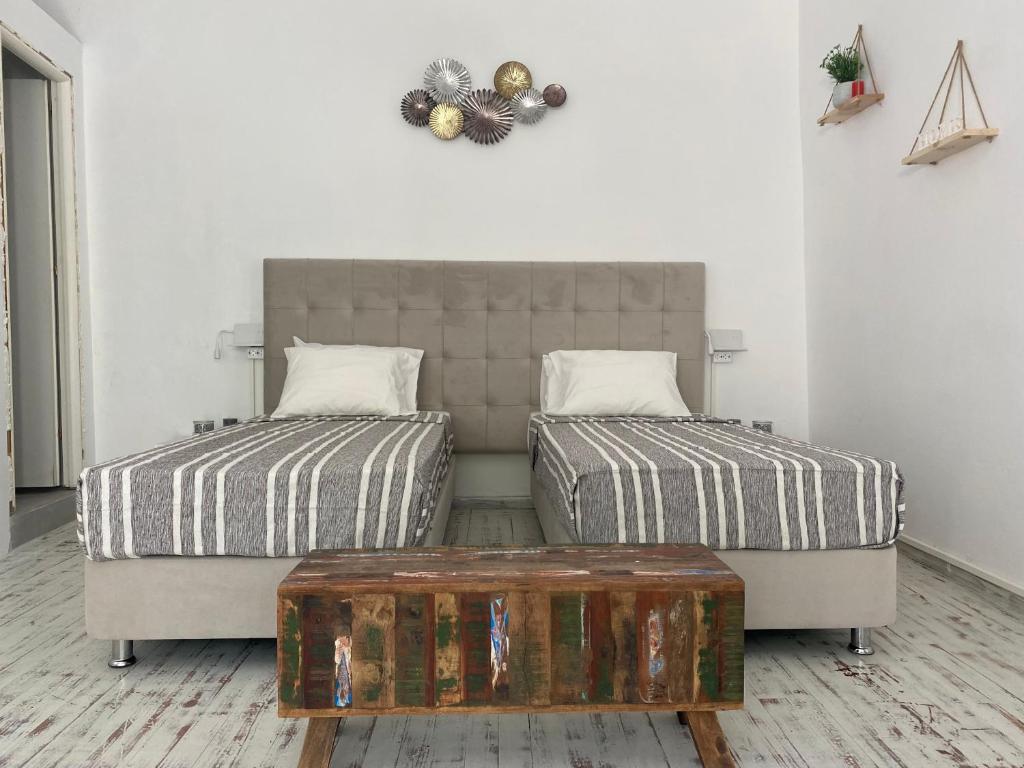 מיטה או מיטות בחדר ב-Cozy Studio Mykonos Town