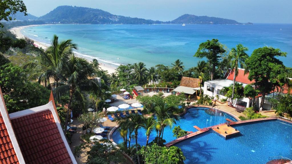 an aerial view of a resort with a pool and the beach at Novotel Phuket Resort in Patong Beach