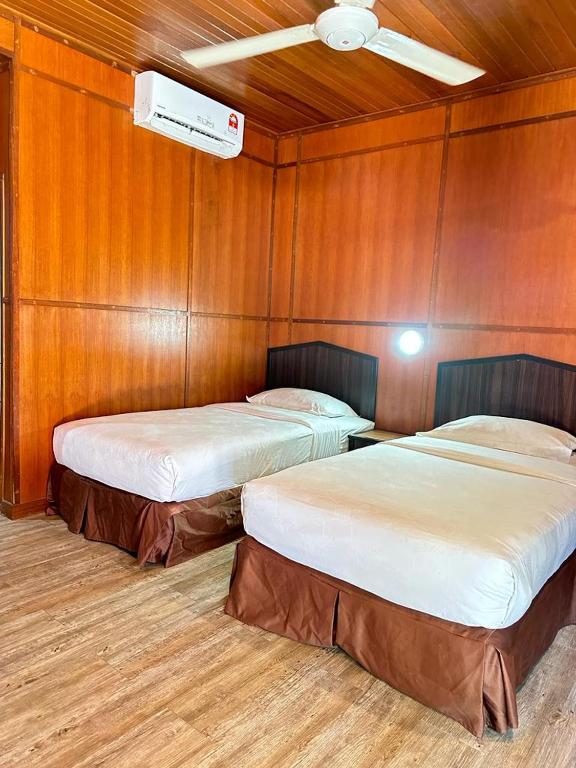 Postel nebo postele na pokoji v ubytování Malibest Resort