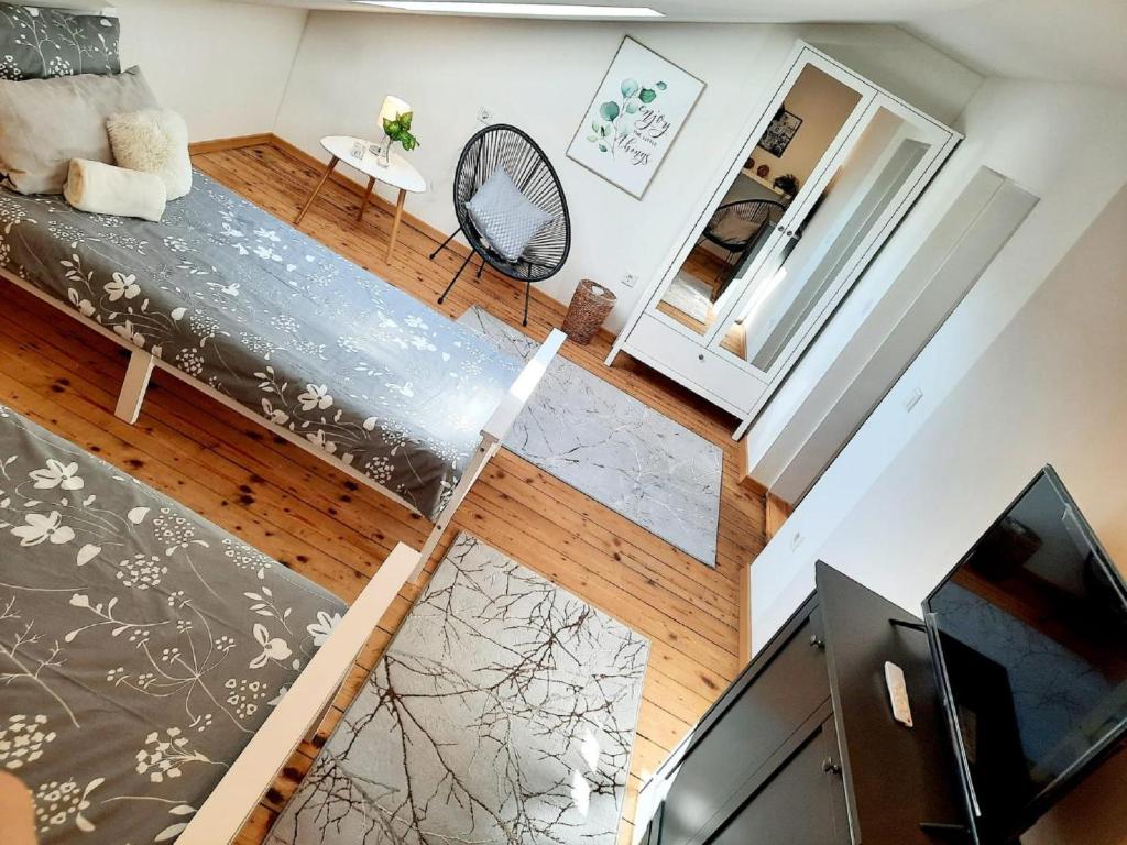 TV a/nebo společenská místnost v ubytování Parkside Appartement