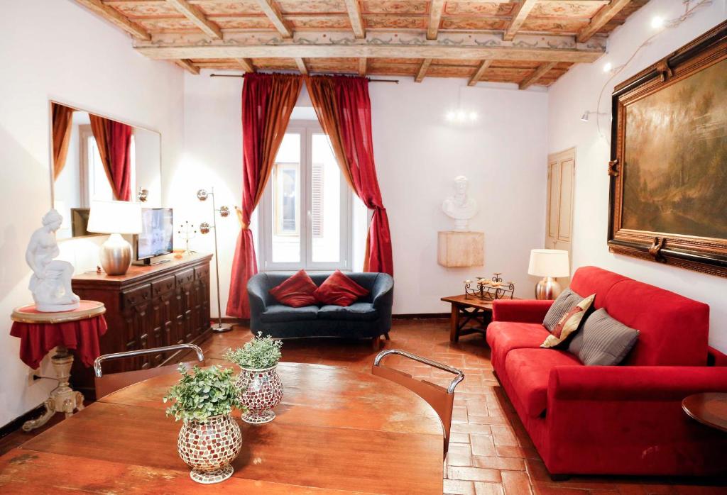 A seating area at Decor Inspiration Apartment - TopCollection