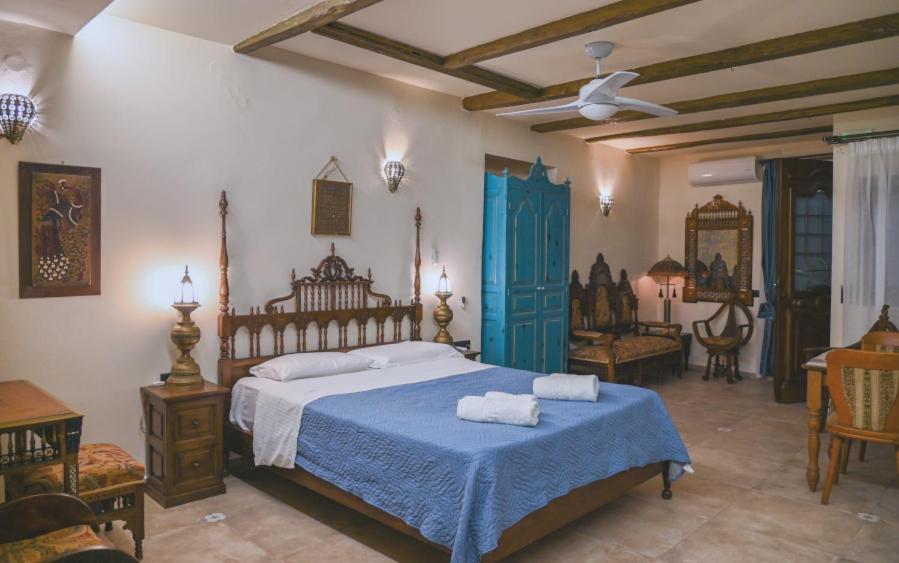 Кровать или кровати в номере Hamam Oriental Suites