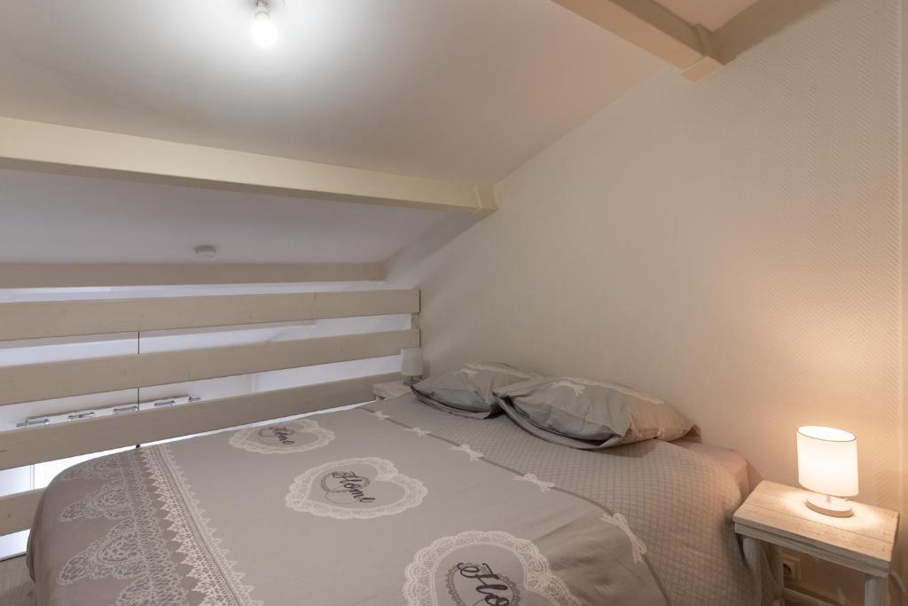 Postel nebo postele na pokoji v ubytování COSY Home - 2 à 4 pers - Aéroport - vieux Blagnac