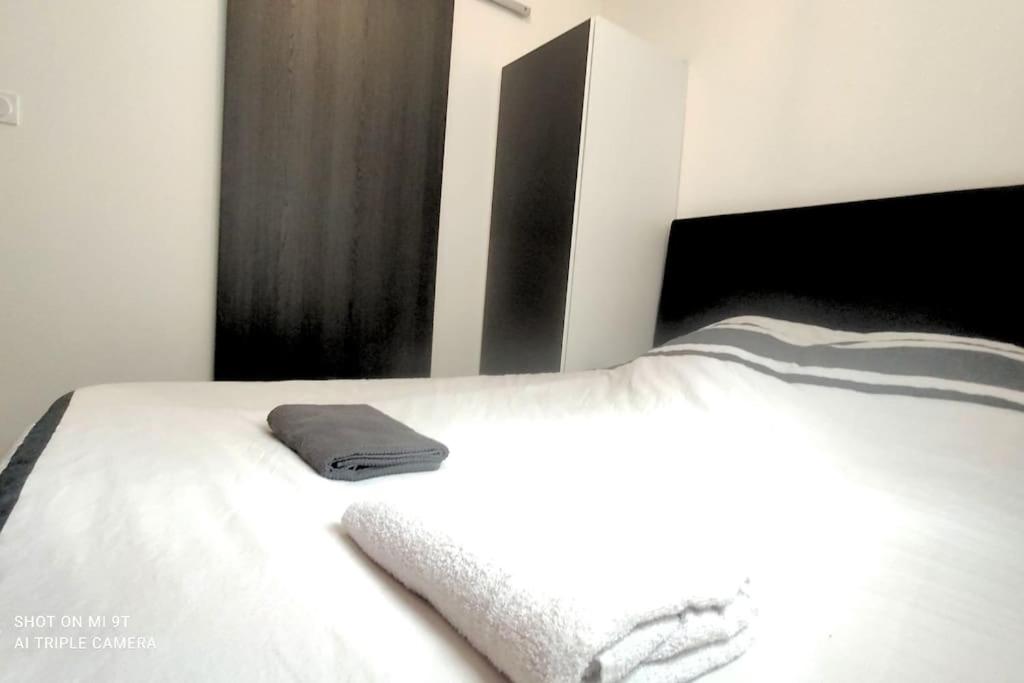 Postel nebo postele na pokoji v ubytování Joli studio à Toulouse - Gare & Métro Matabiau