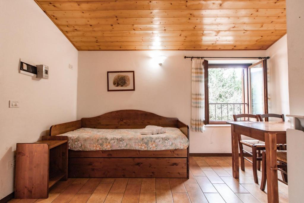 Postel nebo postele na pokoji v ubytování Antico Borghetto - Casa Vacanze