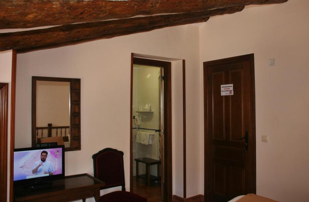 TV a/nebo společenská místnost v ubytování Hotel Olimpia