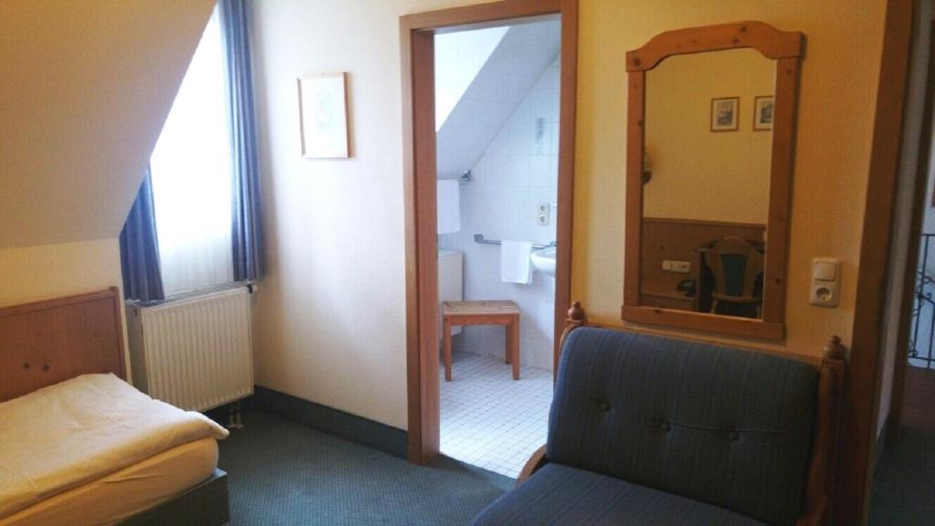 Postel nebo postele na pokoji v ubytování Gasthof zur Schwane