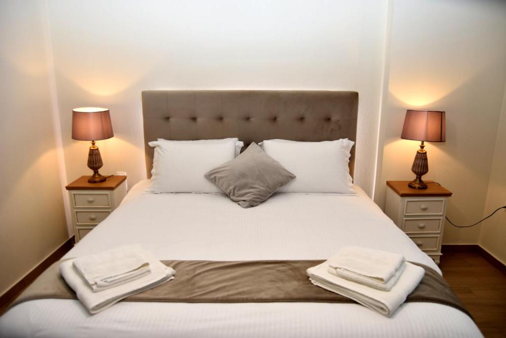 Postel nebo postele na pokoji v ubytování NUCA GUESTHOUSE