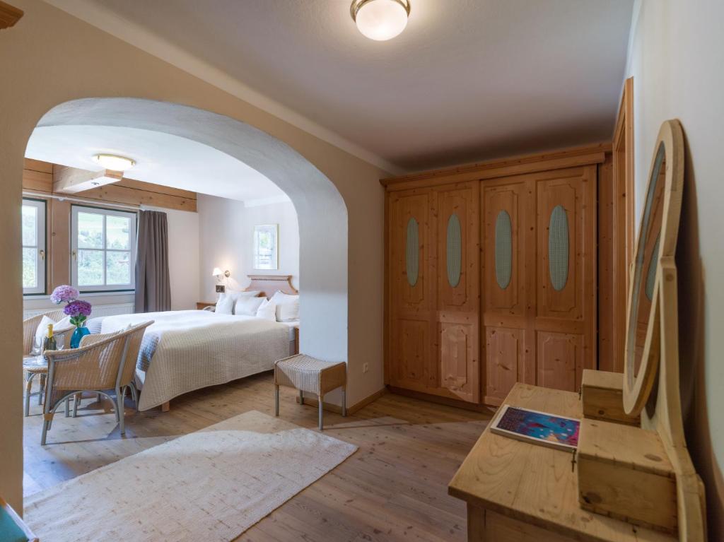 Postel nebo postele na pokoji v ubytování Alpen Glück Hotel Villa Lisa garni