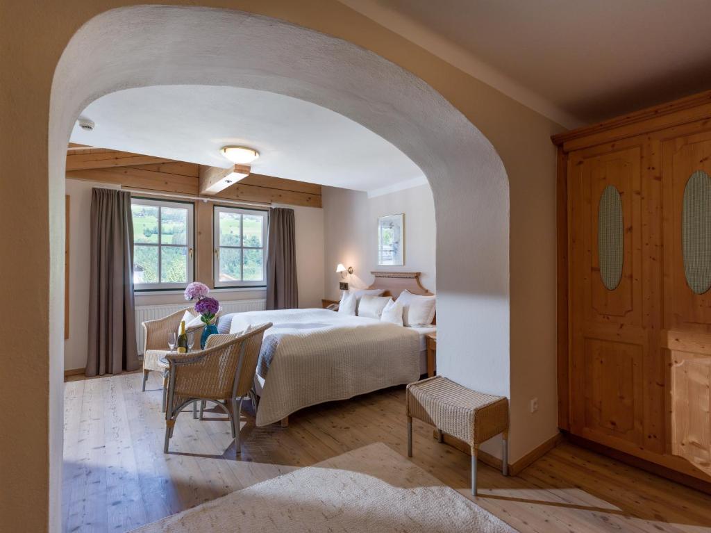 Postel nebo postele na pokoji v ubytování Alpen Glück Hotel Villa Lisa garni