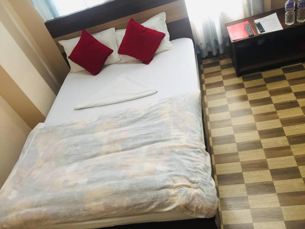 Postel nebo postele na pokoji v ubytování Hotel Rajdhani Visit