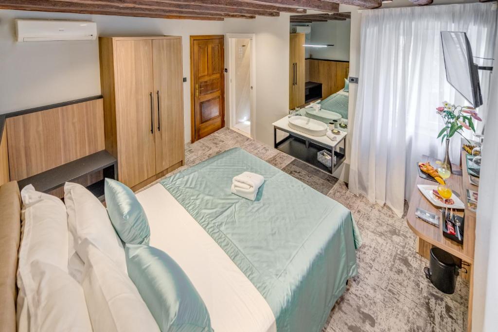 Posteľ alebo postele v izbe v ubytovaní Makarun Heritage Rooms
