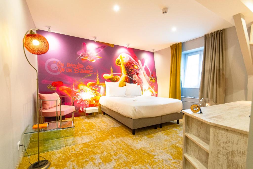 Postel nebo postele na pokoji v ubytování Hotel Beaucour
