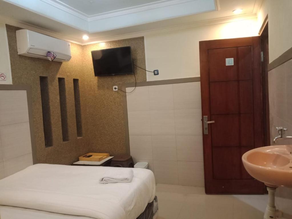 Koupelna v ubytování CALDERA PARK HOMESTAY Syariah