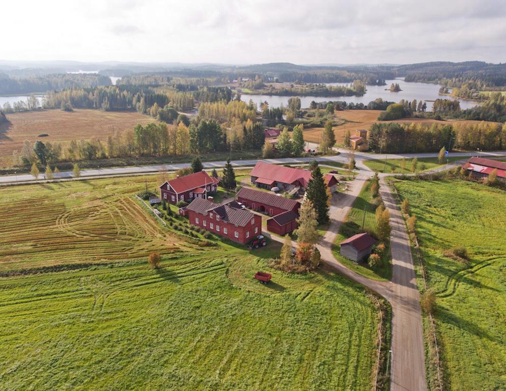 an aerial view of a house in a field at Lemettilä Countryside Accommodation in Petäjävesi