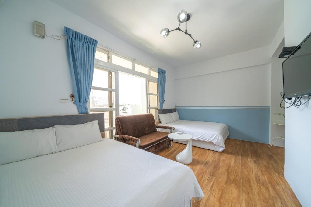 Postel nebo postele na pokoji v ubytování GREEN INN