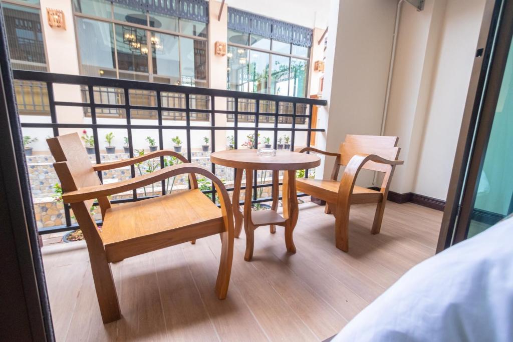 Balkón nebo terasa v ubytování Peacock De Pai Hotel