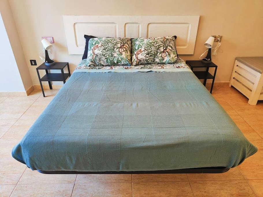 Postel nebo postele na pokoji v ubytování Casa Burbuja Azul