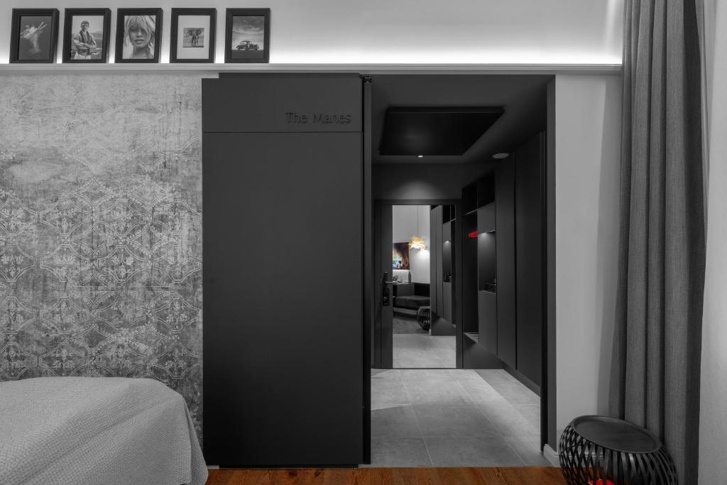 Postel nebo postele na pokoji v ubytování THE MANES Boutique Hotel Prague