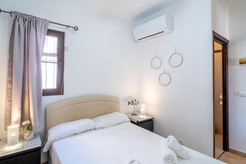 A bed or beds in a room at Los Naranjos 25A Private Pool Capistrano Village