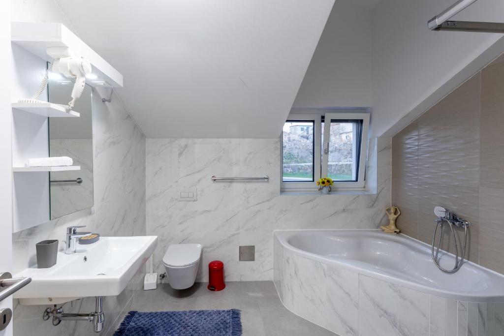 Koupelna v ubytování Rtina Appartements