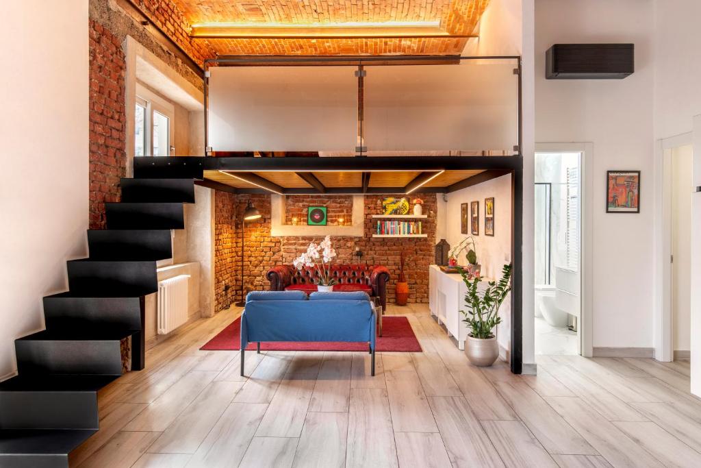 Posezení v ubytování Pop Art Loft con Giardino Privato