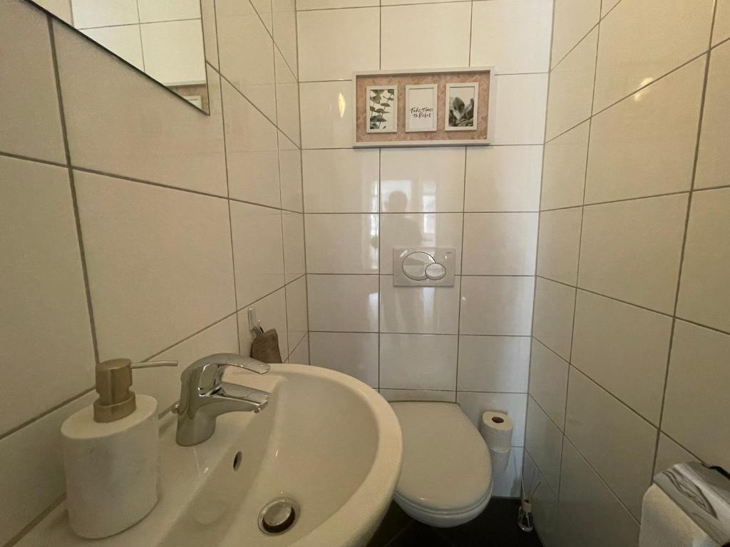 Koupelna v ubytování Wunderschöne Wohnung am See mit Sauna & Whirlpool