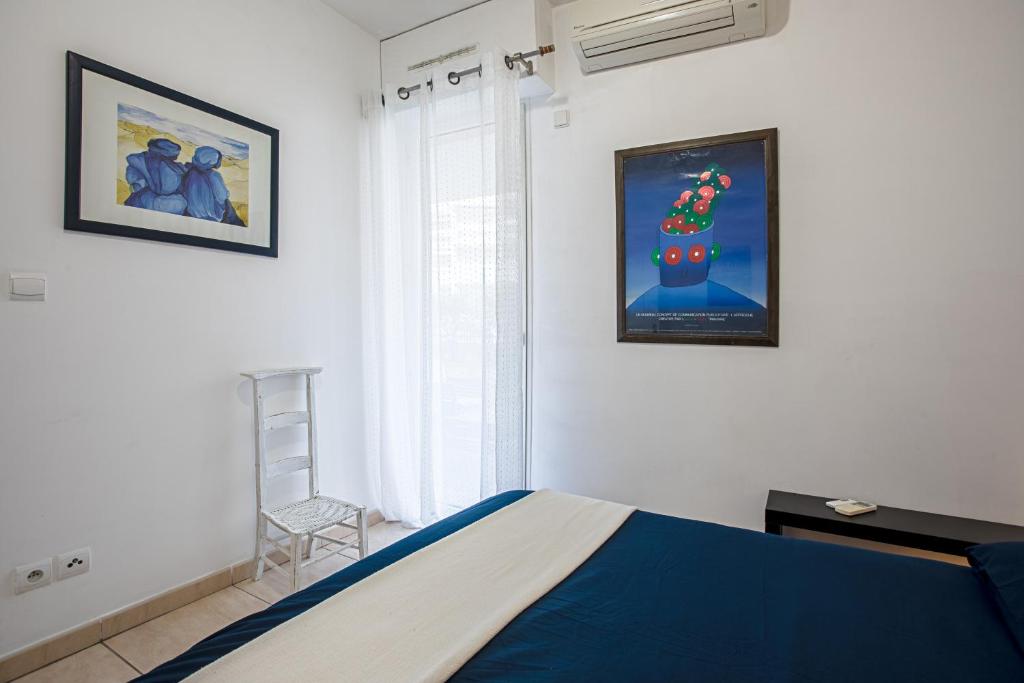 Posteľ alebo postele v izbe v ubytovaní Appartement centre ville Cavalaire