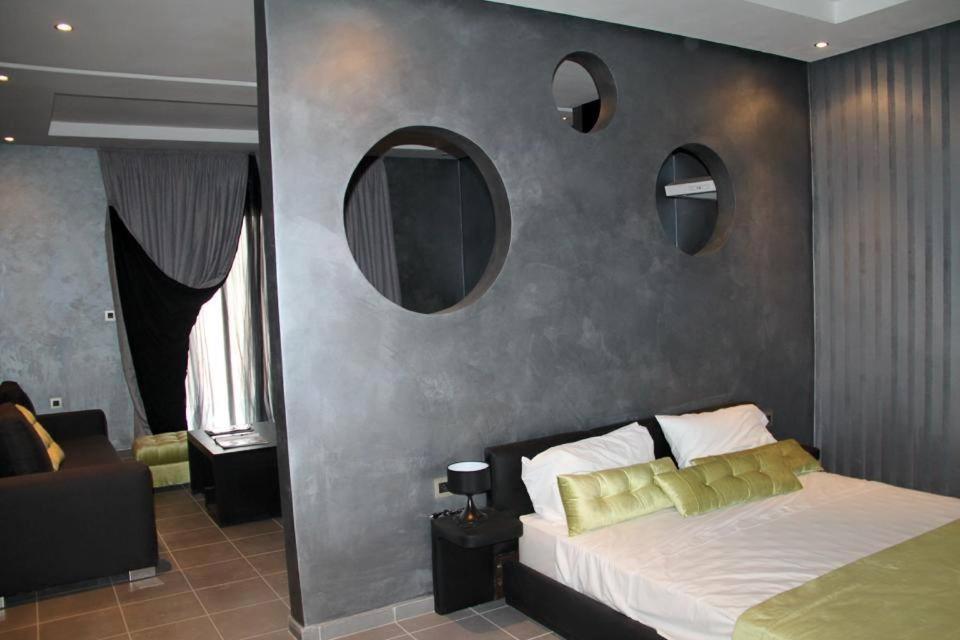 Postel nebo postele na pokoji v ubytování La Suite Hotel Agadir Adults Only