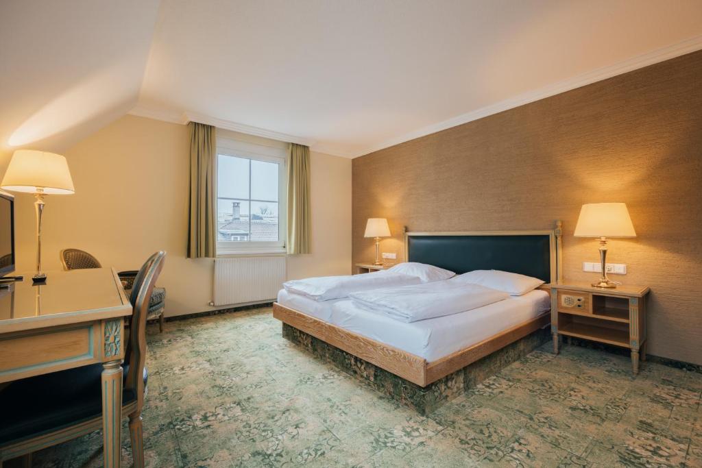 Postel nebo postele na pokoji v ubytování Hotel Bären