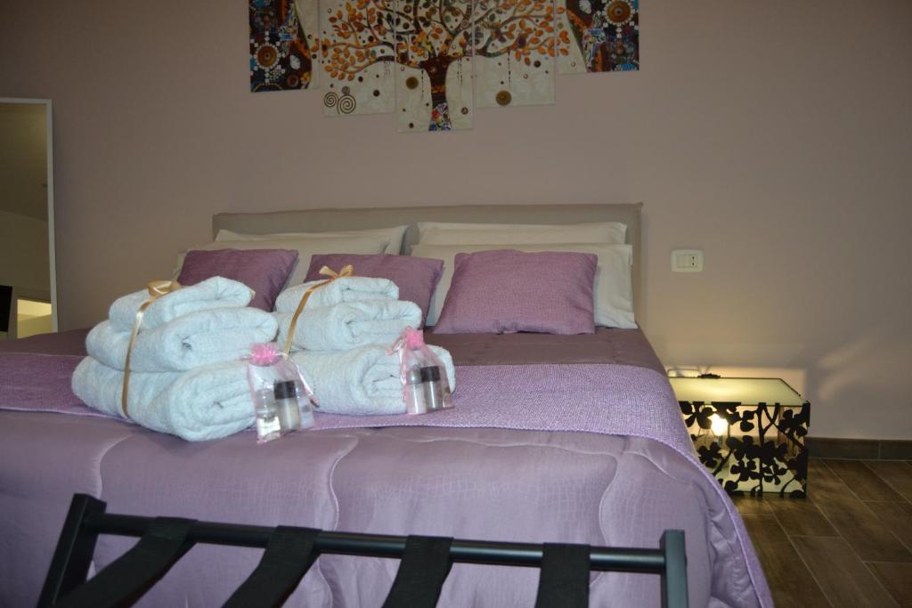 Postel nebo postele na pokoji v ubytování Karina's Rooms