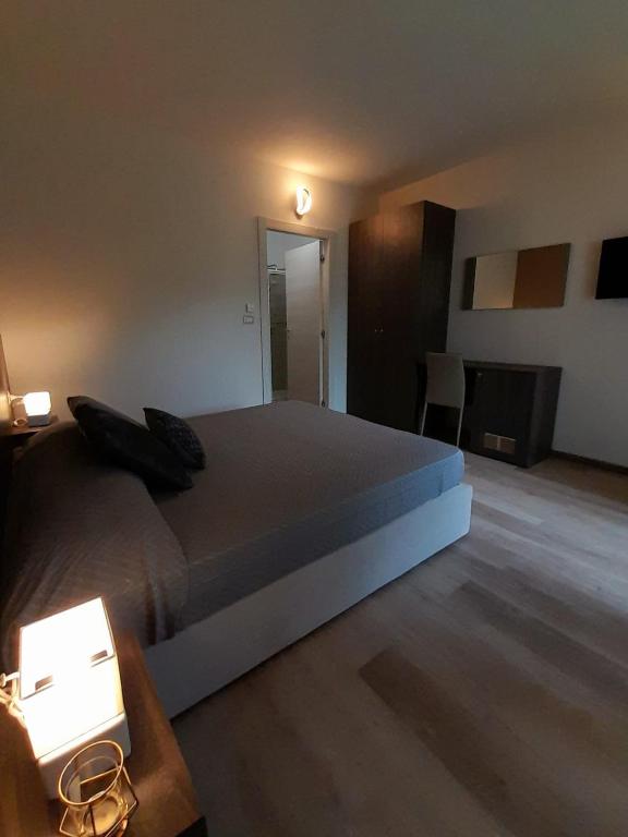Postel nebo postele na pokoji v ubytování Prealpina Hotel