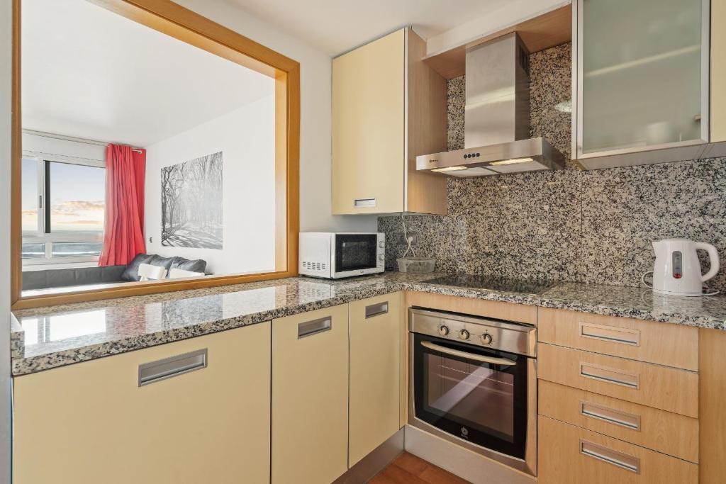 Kuchyň nebo kuchyňský kout v ubytování WELCS APARTAMENTO 051 EMP con vistas al mar