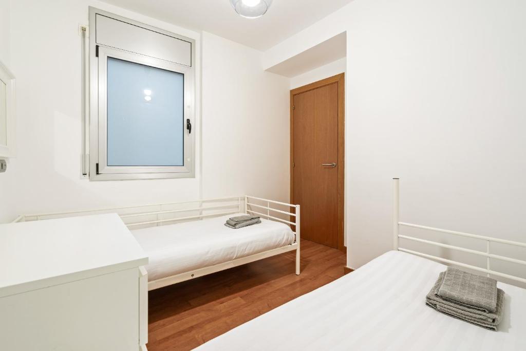 Postel nebo postele na pokoji v ubytování WELCS APARTAMENTO 051 EMP con vistas al mar