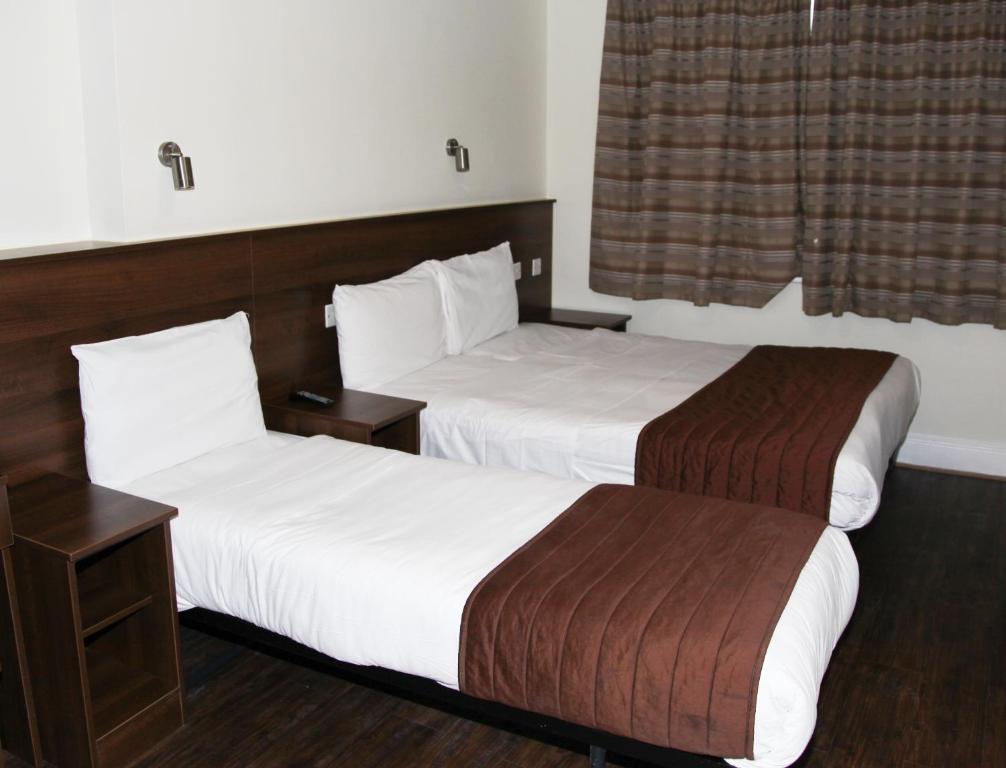 Een bed of bedden in een kamer bij 9a Craven Road