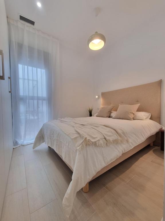 A bed or beds in a room at Residencial de la Yedra