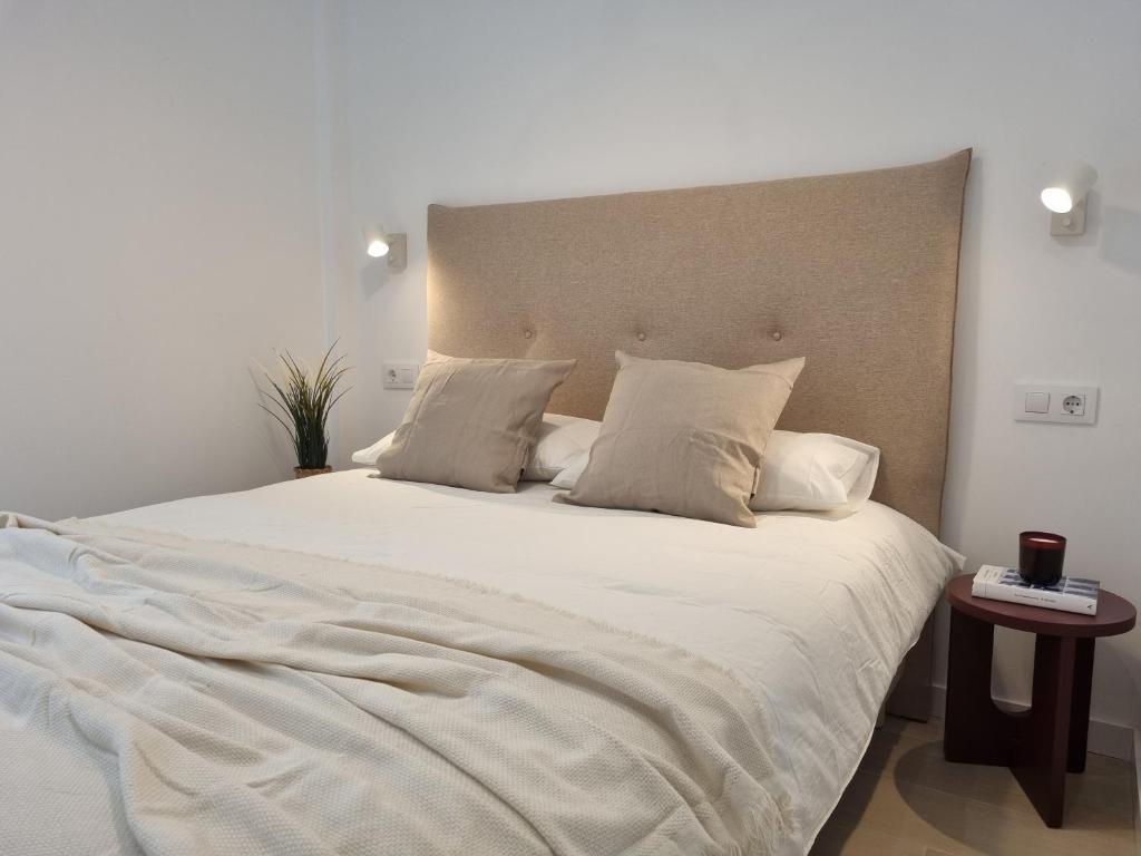 A bed or beds in a room at Residencial de la Yedra