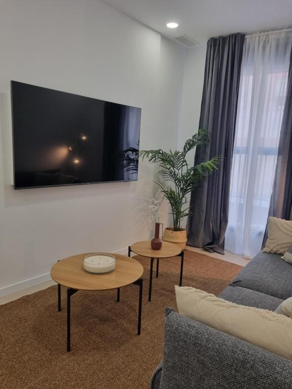 A television and/or entertainment centre at Residencial de la Yedra