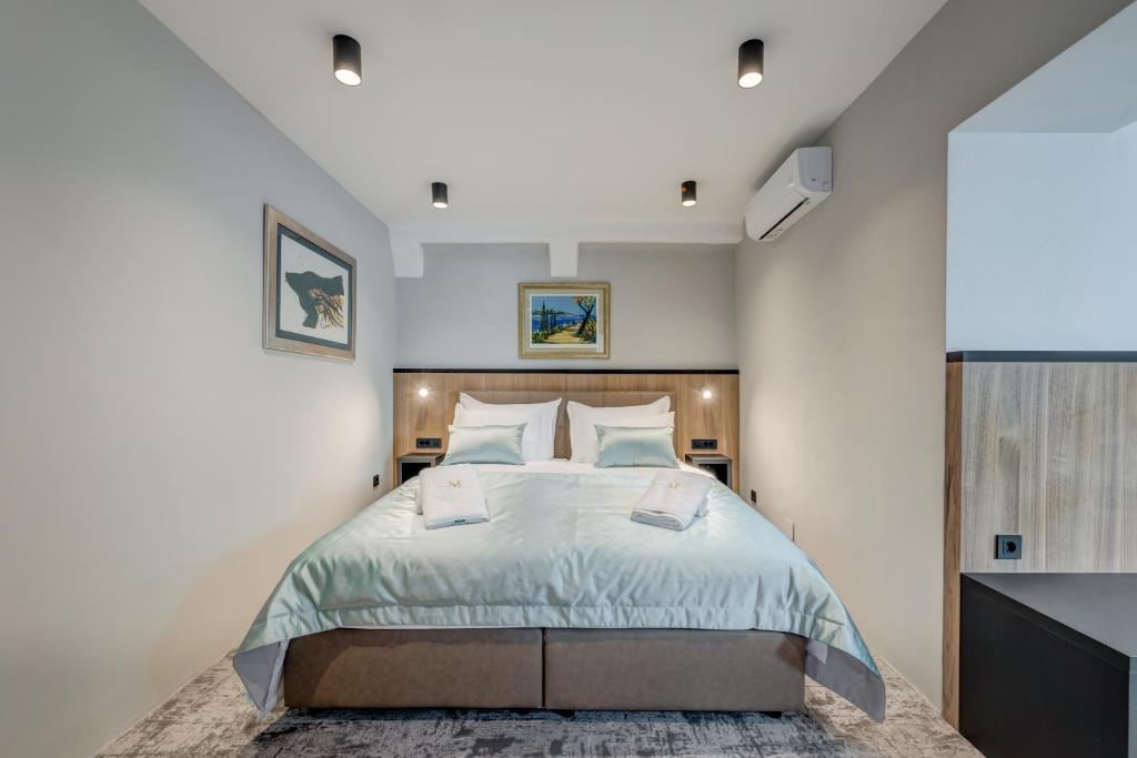 Posteľ alebo postele v izbe v ubytovaní Makarun Heritage Rooms